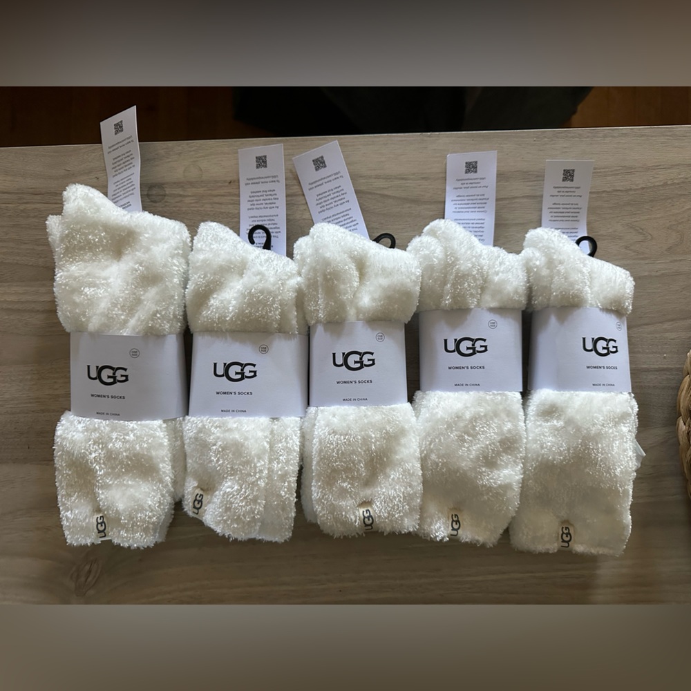 Ugg white fuzzy socks new with tags never used
